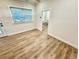 Bedroom with a window and light-colored walls and flooring, showcasing the bright interior at 3607 Umbrella Tree Ln, Oxford, FL 34484