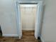 Large closet with plenty of storage space, metal rack, and white doors at 3607 Umbrella Tree Ln, Oxford, FL 34484
