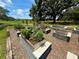 Community garden featuring an array of raised planting beds for herbs, flowers, fruits and vegetables at 3607 Umbrella Tree Ln, Oxford, FL 34484