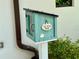 A charming 'Little Free Library' box is mounted outside, inviting community members to share and exchange books at 3607 Umbrella Tree Ln, Oxford, FL 34484