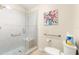 A bathroom with a glass shower at 362 Arbella Loop, The Villages, FL 32162