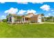 Beautifully landscaped home with a well-maintained lawn and attractive curb appeal in a quiet community at 362 Arbella Loop, The Villages, FL 32162