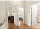 Hallway view showing access to bedroom and bathroom at 362 Arbella Loop, The Villages, FL 32162