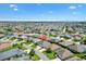 An aerial view of a home nestled in a peaceful neighborhood offering a sense of community and belonging at 3759 Orient Ave, The Villages, FL 32163