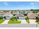 Charming single-story home with well-manicured lawn, paver driveway, and two-car garage in a beautiful neighborhood at 3759 Orient Ave, The Villages, FL 32163