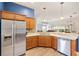 An inviting kitchen featuring stainless steel appliances and a functional layout at 3759 Orient Ave, The Villages, FL 32163