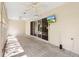 This sunroom provides great light, tile flooring, a TV, and lots of open space at 3759 Orient Ave, The Villages, FL 32163