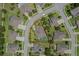 Overhead shot of the property highlighting the home, pool, and surrounding neighborhood at 4018 Chandler Estates Dr, Apopka, FL 32712