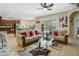 Bright and airy living space with tile flooring, comfortable seating, and a view of the pool at 4018 Chandler Estates Dr, Apopka, FL 32712