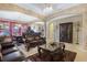 Open-concept living room flows into the dining area, creating an ideal space for entertaining guests at 4018 Chandler Estates Dr, Apopka, FL 32712