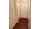 Hallway featuring wood-look floors and several doors at 402 E Maple St, Winter Garden, FL 34787