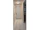 Hallway with ceramic flooring and white doors at 402 E Maple St, Winter Garden, FL 34787