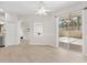 Bright dining room with tile floors and access to the patio at 425 Glen Arbor Ln, Leesburg, FL 34748