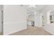 Bright living room with tile floors, with view of the kitchen at 425 Glen Arbor Ln, Leesburg, FL 34748