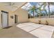 Covered back patio perfect for outdoor living, with decorative walls at 425 Glen Arbor Ln, Leesburg, FL 34748