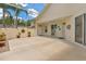 Back patio featuring decorative walls and a covered structure at 425 Glen Arbor Ln, Leesburg, FL 34748