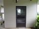 This is a back door with a screen at 432 Santa Fe E Rd, Tavares, FL 32778