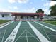 Community shuffleboard courts offer recreational fun at 432 Santa Fe E Rd, Tavares, FL 32778