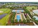 Aerial view showcasing the community tennis and bocce ball courts at 4701 Nw 51St Terrace Rd, Ocala, FL 34482