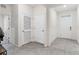 Bright foyer featuring a tile floor with entry door and closet door at 4701 Nw 51St Terrace Rd, Ocala, FL 34482