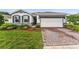Charming single-story home featuring well-manicured landscaping and a two-car garage at 4701 Nw 51St Terrace Rd, Ocala, FL 34482