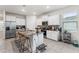 Modern kitchen with granite countertops, stainless steel appliances, and island seating at 4701 Nw 51St Terrace Rd, Ocala, FL 34482