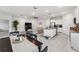 Spacious living room featuring an open layout connecting the kitchen and dining area at 4701 Nw 51St Terrace Rd, Ocala, FL 34482