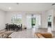 This room offers a dining area, sliding glass doors to the lanai, and tile flooring at 4701 Nw 51St Terrace Rd, Ocala, FL 34482