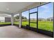 Screened-in patio perfect for enjoying the outdoors while offering protection from insects at 4701 Nw 51St Terrace Rd, Ocala, FL 34482