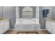 Bathroom includes a large soaking tub, dual vanities, and neutral decor at 4826 Sable Ridge Ct, Leesburg, FL 34748