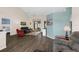 Open-concept living area with modern flooring and a view of the backyard at 4826 Sable Ridge Ct, Leesburg, FL 34748