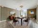 Inviting dining room featuring stylish decor and ample seating for gatherings at 504 Banning Beach Rd, Tavares, FL 32778