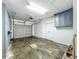 Garage features built in cabinets for maximum storage at 504 Banning Beach Rd, Tavares, FL 32778