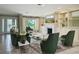 Elegant living room with fireplace, built-ins, and ample natural light at 504 Banning Beach Rd, Tavares, FL 32778