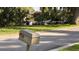 Street view of a mailbox and boat parked on a lawn at 504 Banning Beach Rd, Tavares, FL 32778