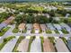 Charming single-story home featuring a well-manicured lawn and inviting curb appeal in a tranquil residential neighborhood at 5507 Laver St, Leesburg, FL 34748