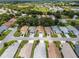 Charming single-story home featuring a well-manicured lawn and inviting curb appeal in a tranquil residential neighborhood at 5507 Laver St, Leesburg, FL 34748