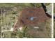 Aerial view showing the property boundaries of this large parcel of land, conveniently located near a major roadway at 5729 Bible Camp Rd, Groveland, FL 34736