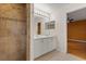 Bathroom with tile shower at 5729 Bible Camp Rd, Groveland, FL 34736