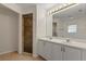 Bathroom features double sinks and tile shower at 5729 Bible Camp Rd, Groveland, FL 34736