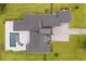 Stunning aerial view of an estate home with pool, patio, and pristine landscaping and driveway at 6031 Dora Dr, Mount Dora, FL 32757