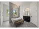Beautiful bathroom featuring a soaking tub with a view, vanity with a stone countertop, and designer tile at 6031 Dora Dr, Mount Dora, FL 32757