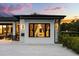 Exterior view showcasing a window with the curtains open, providing a glimpse of the interior at 6031 Dora Dr, Mount Dora, FL 32757