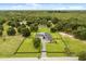 Beautiful home with an expansive yard and a long driveway providing privacy in a lush, green setting at 6031 Dora Dr, Mount Dora, FL 32757