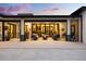 Covered patio features outdoor sofas, and an open view of pool and backyard at 6031 Dora Dr, Mount Dora, FL 32757