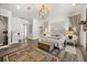 Bright and spacious main bedroom with decorative headboard, stylish rug, and modern lighting at 6031 Dora Dr, Mount Dora, FL 32757