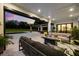 Relaxing outdoor living space with comfortable seating and expansive views of the landscaped backyard at 6031 Dora Dr, Mount Dora, FL 32757