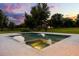 Backyard pool and spa surrounded by green landscape perfect for relaxation and recreation at 6031 Dora Dr, Mount Dora, FL 32757