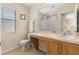 The bathroom has a single sink vanity with a large mirror at 624 Terra Lago St, Davenport, FL 33897