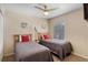 Charming bedroom featuring two twin beds and a ceiling fan at 624 Terra Lago St, Davenport, FL 33897